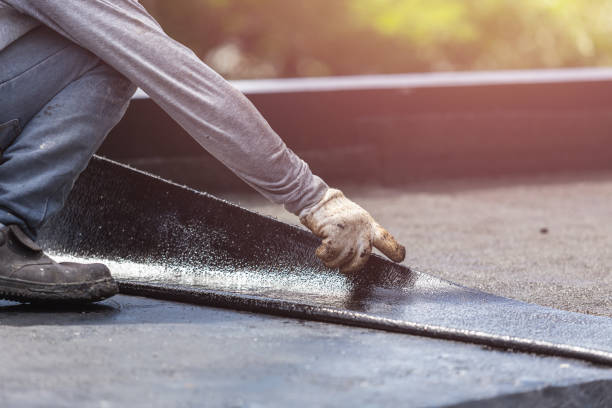 Professional Basement Waterproofing technician working in Tall Timbers, MD